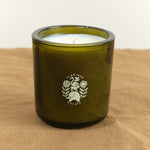 Climbing Tuscan Rosemary Candle on table