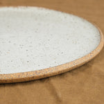 Side of 11" Stillness Plate in Sandstone