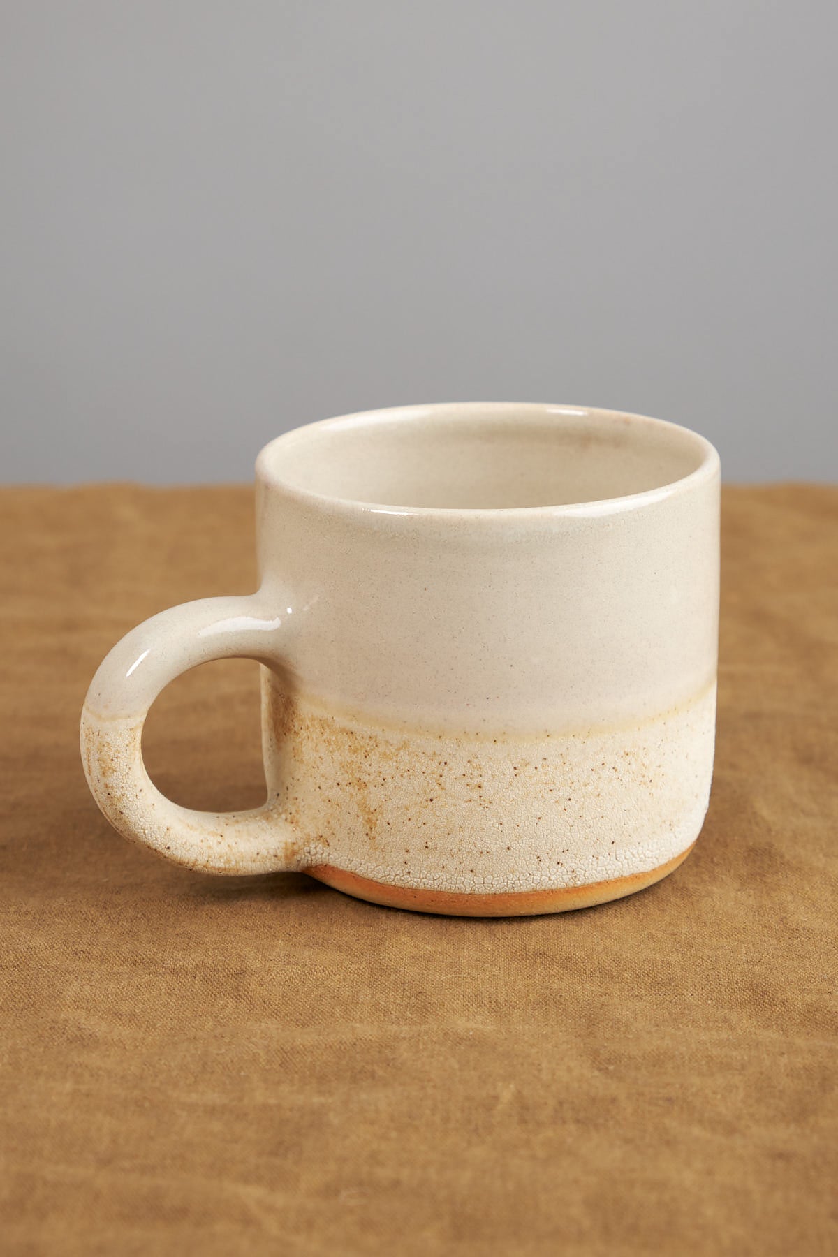 Close up of Stoneware Coffee Mug in White Stoneware