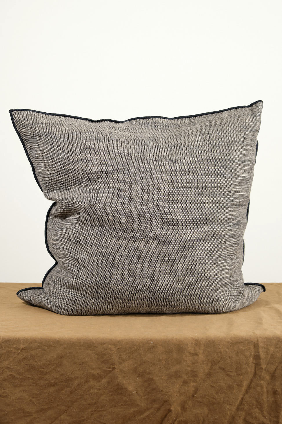 26" X 26" Chinee Canvas Rustique Cushion on table
