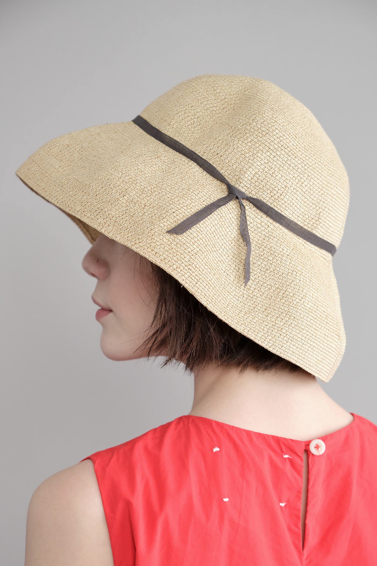 Side of Low Wide Paper Hat in Natural/Charcoal