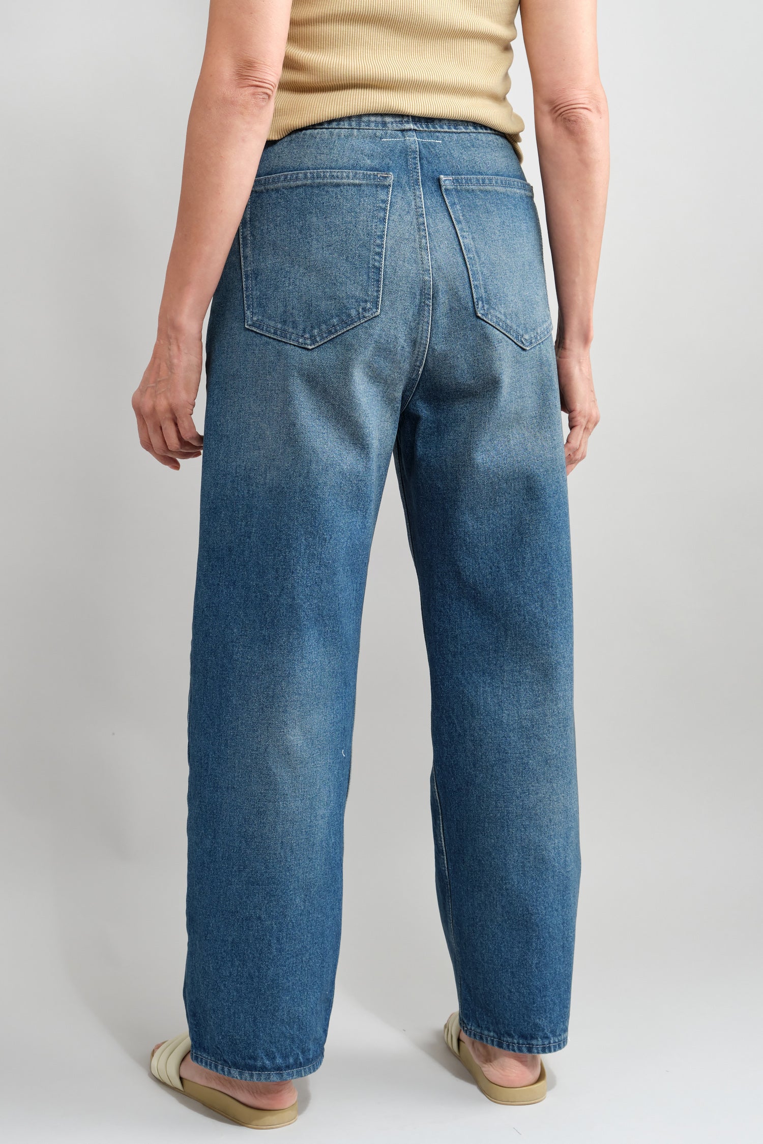 Back of Carrot Jeans in Medium Wash