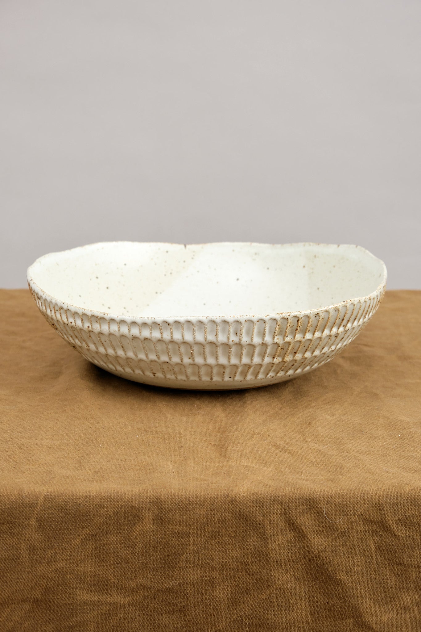 Mt. Washington Pottery Carved Eggshell Serving Bowl in Speckled White