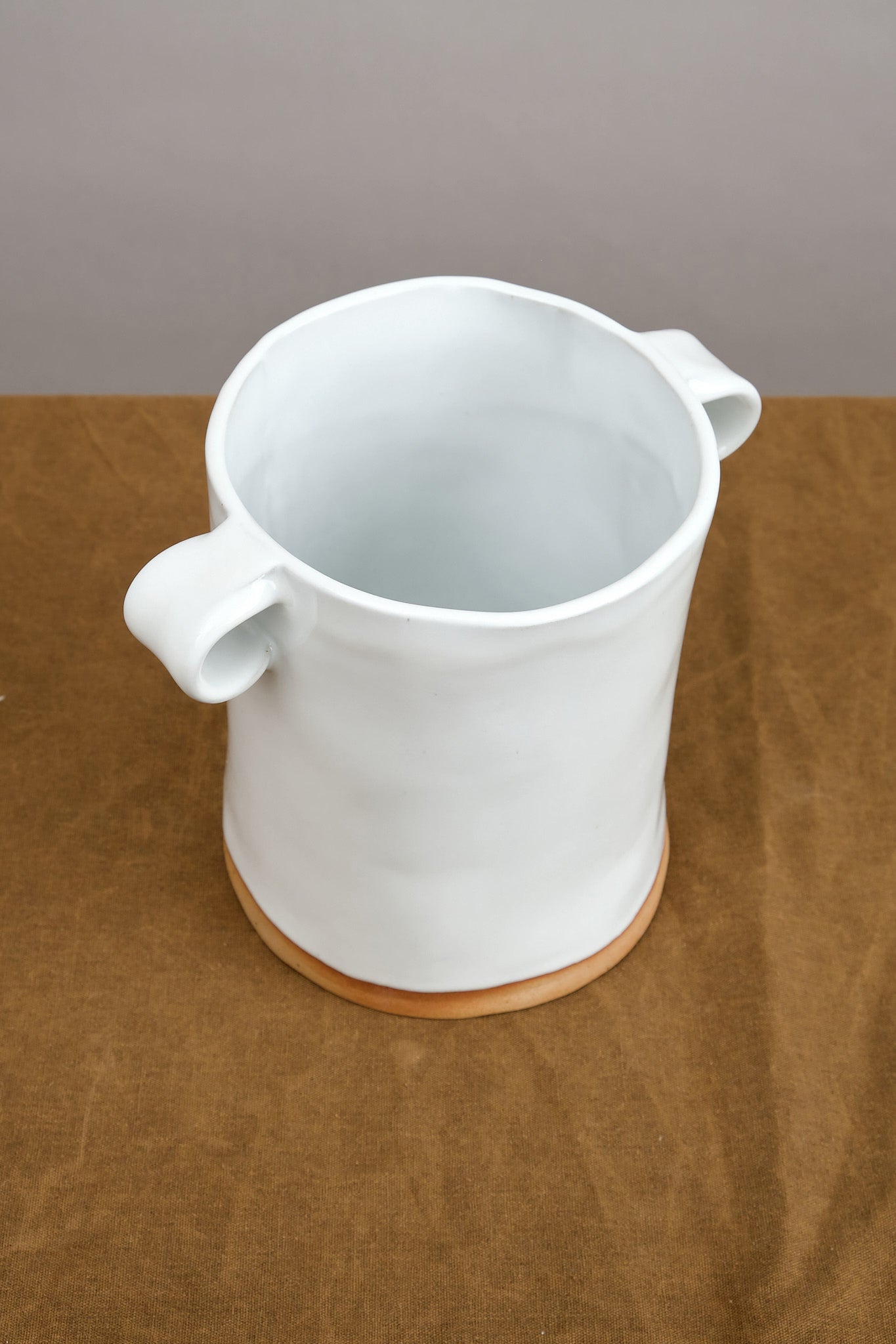 Mt. Washington Pottery Looped Handle Cache Pot in white