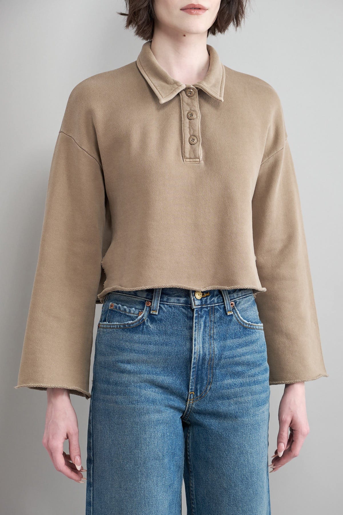 Front of Nelson Crop Polo in Pigment Java