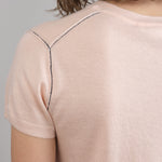 Back detailing on Crew Tee in Pale Apricot