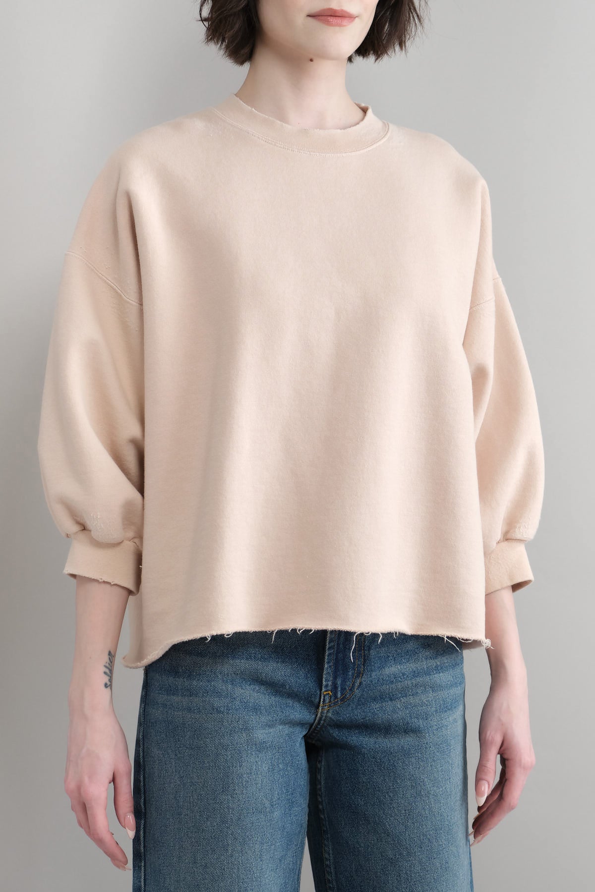 Front of Fond Sweatshirt in Oyster