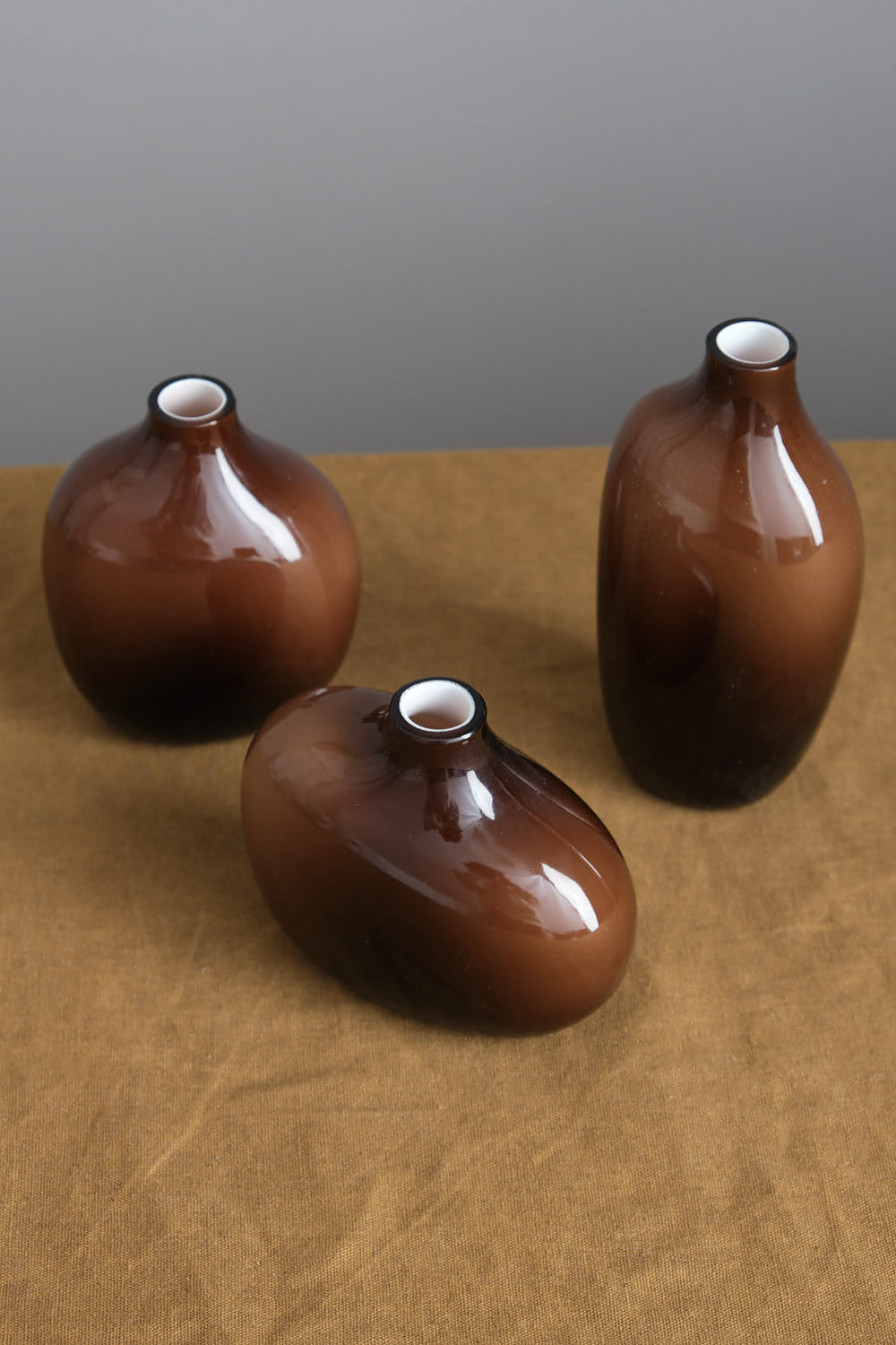 Various brown sacco vases