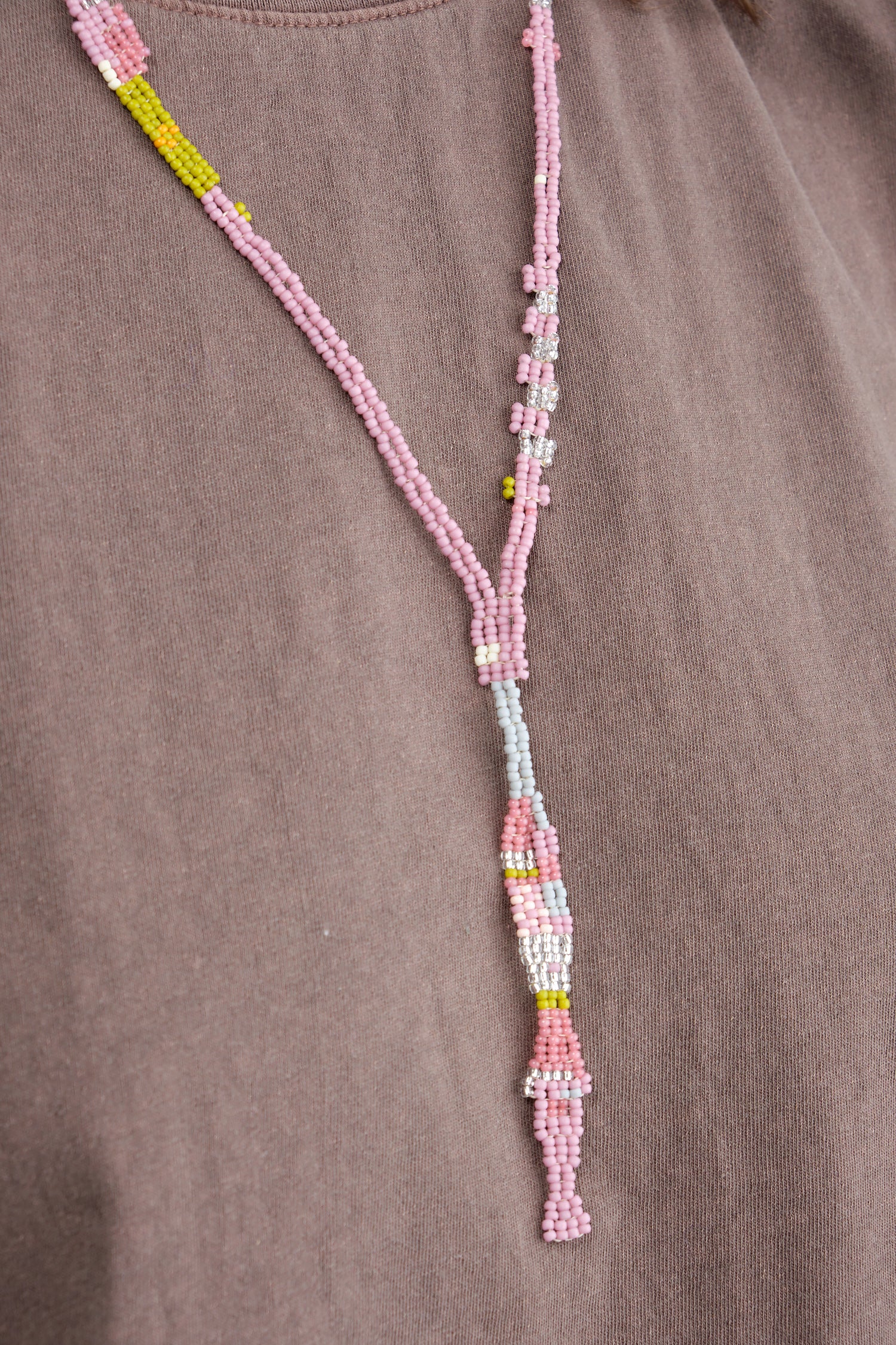 Close up of Fara Necklace in Purple