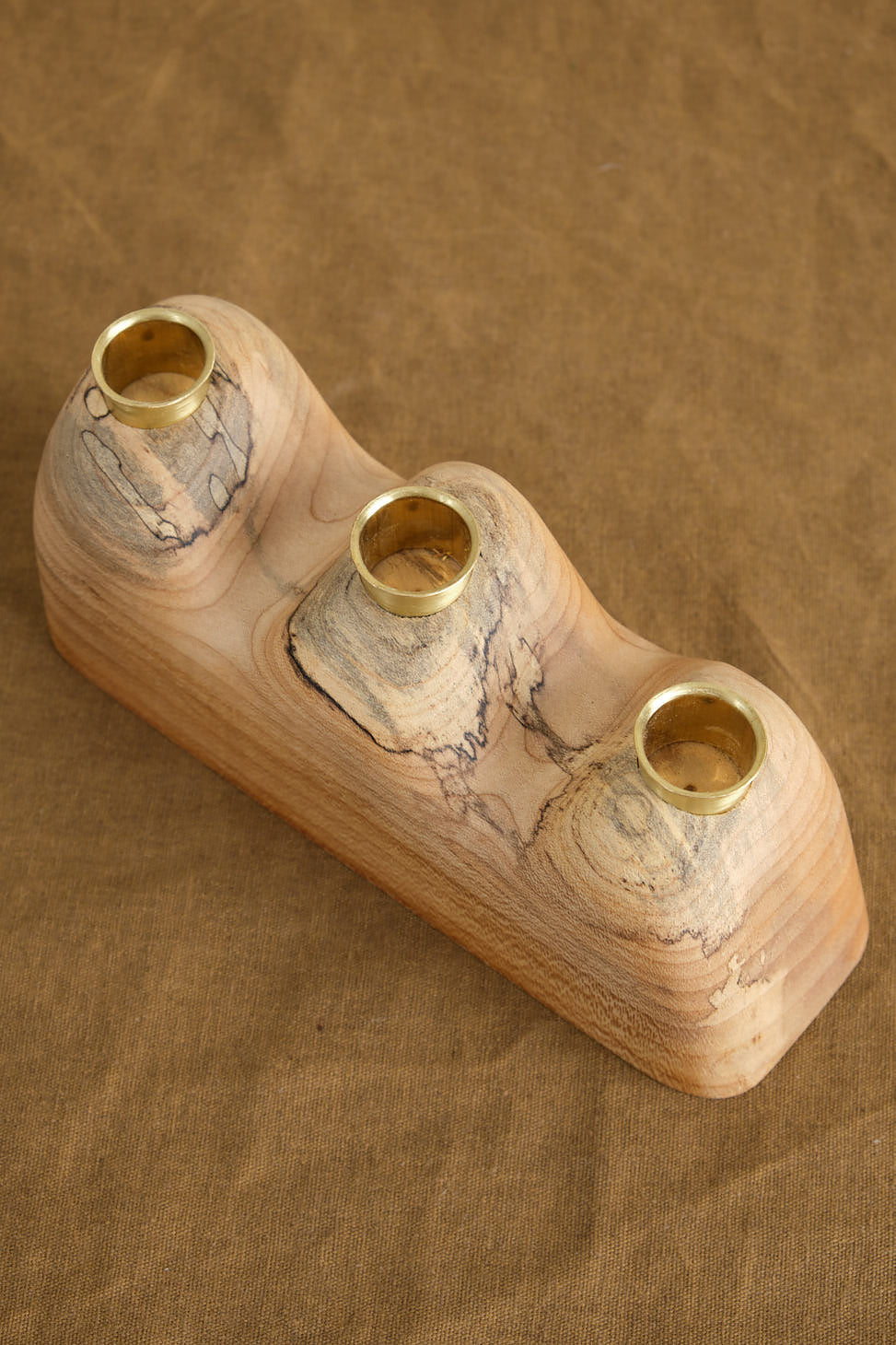 Inside of Triple Flow Candle Holder in Maple