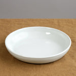 Medium Coupe Plate on table